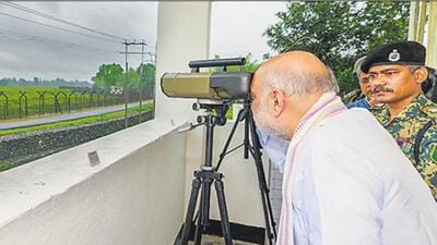 Union home minister Amit Shah on Saturday inspected an indigenous radio-based fence breach detection system along the India-Bangladesh border in West Bengal Union home minister Amit Shah on Saturday inspected an indigenous radio-based fence breach detection system along the India-Bangladesh border in West Bengal