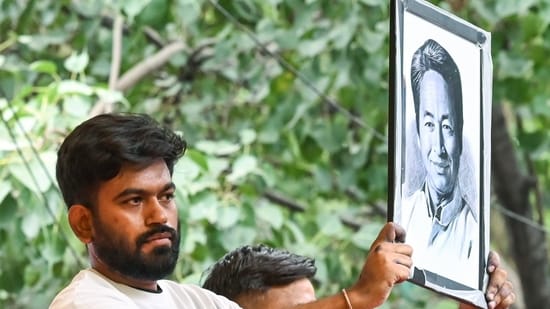 CJP founder Abhijeet Dipke with a portrait of environmentalist Sonam Wangchuk after the latter's hospitalisation