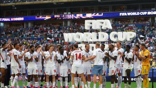Soccer Football - FIFA World Cup 2026 - Bronze Final - France v England - Miami Stadium, Miami Gardens, Florida, U.S. - July 18, 2026 England players celebrate on the podium after winning the Bronze Final (IMAGN IMAGES via Reuters)