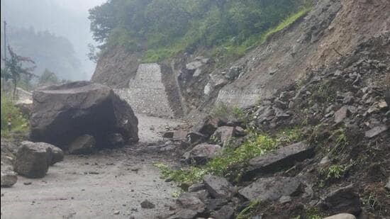 The stretch of road closed due to landslide and boulder fall near Ojri on Sunday morning in Uttarkashi district. (HT picture)