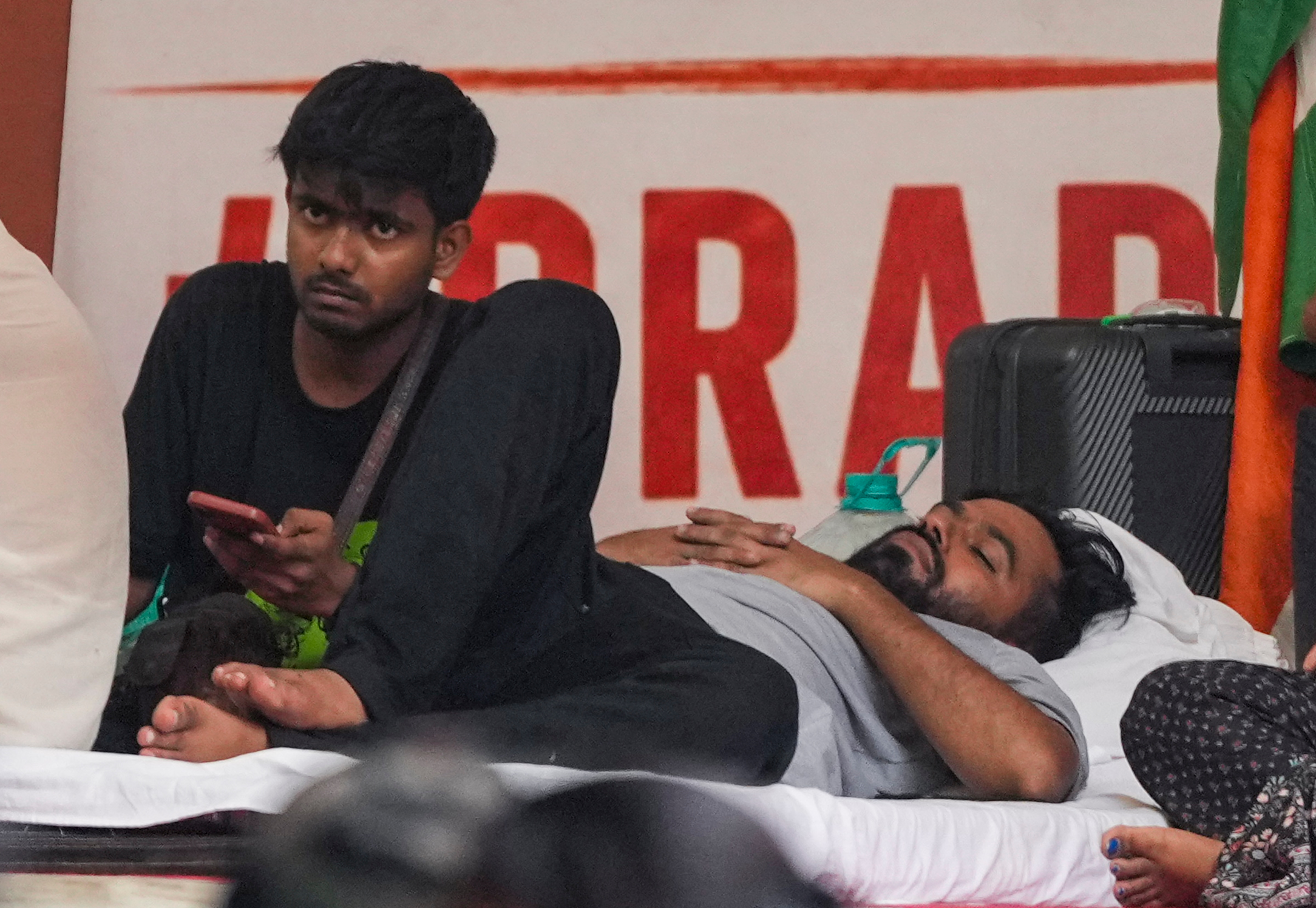 Cockroach Janata Party (CJP) founder Abhijeet Dipke during a protest demanding Union education minister Dharmendra Pradhan's resignation over alleged irregularities in the NEET examination, at the Jantar Mantar in New Delhi on Sunday, July 19, 2026. Dipke announced an indefinite hunger strike soon after activist Sonam Wangchuk was removed from the site on Saturday by the Delhi Police and taken to Safdarjung Hospital. (PTI Photo)