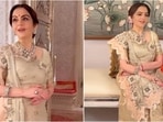 Nita Ambani radiates elegance in an ivory saree for pooja, celebrating Indian craftsmanship.(Instagram/@souravv_roy_)