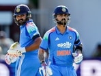 India's Rohit Sharma and Virat Kohli run between wickets. India's Rohit Sharma and Virat Kohli run between wickets.