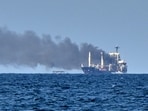 Smoke rises from the grain carrier Golden Leo under the Guinea-Bissau flag after Russian missile strike in the Black Sea close to Odessa, Ukraine, Sunday, July 19, 2026, local media reports.