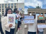 The demonstration appeared to take place near Berlin’s iconic Brandenburg Gate.