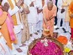 Chief minister Yogi Adityanath performs arti to Lord Mahadev at the ancient Lodheshwar Mahadev Temple, in Barabanki on Monday. (Sourced)