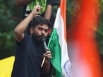 Abhijeet Dipke, head of the Cockroach Janta Party (CJP) addresses supporters at a protest site ahead of a planned march to Parliament on the opening day of the monsoon session.
