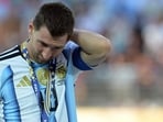 Lionel Messi reacts after he was handed a silver medal during the award ceremony of the 2026 FIFA World Cup. (AFP)