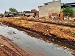 Releasing cow dung on roads and into drainage has been a common sight by dairy unit owners in Ludhiana. (Manish/HT)