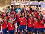 EAST RUTHERFORD, NEW JERSEY - JULY 19: Rodri #16 of Spain lifts the FIFA World Cup Winner�s Trophy after the team�s victory following the FIFA World Cup 2026 Final match between Spain and Argentina at New York New Jersey Stadium on July 19, 2026 in East Rutherford, New Jersey. David Ramos/Getty Images/AFP (Photo by David Ramos / GETTY IMAGES NORTH AMERICA / Getty Images via AFP)