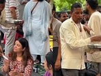 CJP protest video shows man serving food to protesters.