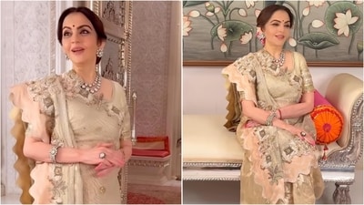 Nita Ambani radiates elegance in an ivory saree for pooja, celebrating Indian craftsmanship. Nita Ambani radiates elegance in an ivory saree for pooja, celebrating Indian craftsmanship.