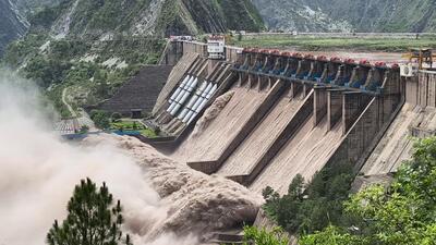 A view of the multiple open spillway gates of Salal Dam amid rising water levels of the Chenab River, in Reasi on Sunday (ANI video Grab) A view of the multiple open spillway gates of Salal Dam amid rising water levels of the Chenab River, in Reasi on Sunday (ANI video Grab)
