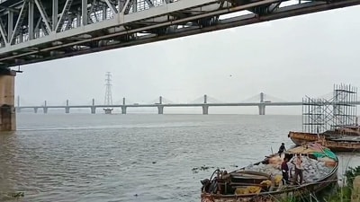 Three individuals taken into custody by Ayodhya police following a viral video which showed them consuming mutton and beer aboard a boat on Saryu river (ANI) Three individuals taken into custody by Ayodhya police following a viral video which showed them consuming mutton and beer aboard a boat on Saryu river (ANI)