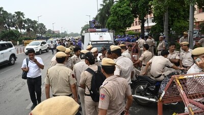 New Delhi, India - July 20, 2026: Police personnel barricades and verify the identity cards of visitors amid heightened security as supporters of the Cockroach Janata Party (CJP) stage a protest at near Parliament house in New Delhi, India, on Monday, July 20, 2026. (Photo by Arvind Yadav/ Hindustan Times) New Delhi, India - July 20, 2026: Police personnel barricades and verify the identity cards of visitors amid heightened security as supporters of the Cockroach Janata Party (CJP) stage a protest at near Parliament house in New Delhi, India, on Monday, July 20, 2026. (Photo by Arvind Yadav/ Hindustan Times)