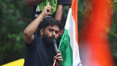 Abhijeet Dipke, head of the Cockroach Janta Party (CJP) addresses supporters at a protest site ahead of a planned march to Parliament on the opening day of the monsoon session. (REUTERS)