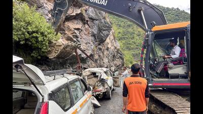 Rescue operation underway after falling boulders struck a passenger bus and vehicle, killing two persons and leaving six others injured, near Raggi Nallah on NH 244, in Doda on Monday. (PTI) Rescue operation underway after falling boulders struck a passenger bus and vehicle, killing two persons and leaving six others injured, near Raggi Nallah on NH 244, in Doda on Monday. (PTI)