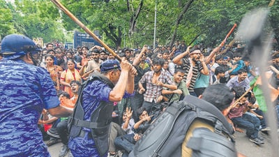 Security personnel carry out lathicharge during the protest on Monday. (RAJ K RAJ /HT PHOTO)