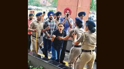 Students protesting against symposium on Shakti and Shriti at PU Campus on Monday. (Keshav Singh/HT)