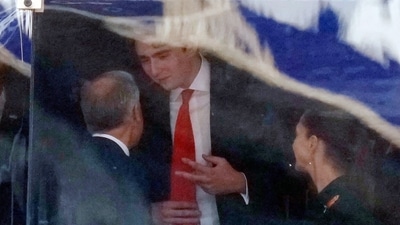 Canada Prime Minister Mark Carney talks with Barron Trump during the FIFA World Cup final action, in East Rutherford, N.J., on Saturday, July 19, 2026. (Frank Gunn/The Canadian Press vi) Canada Prime Minister Mark Carney talks with Barron Trump during the FIFA World Cup final action, in East Rutherford, N.J., on Saturday, July 19, 2026. (Frank Gunn/The Canadian Press vi)