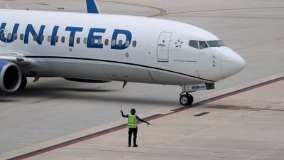 Julio Varela says a United Airlines employee threatened to report him to ICE during a ticketing dispute at SFO. (AFP Getty Images) Julio Varela says a United Airlines employee threatened to report him to ICE during a ticketing dispute at SFO. (AFP Getty Images)