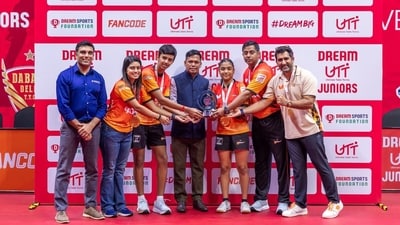 Dr. Ajay R. Gaude, Executive Director, Sports Authority of Goa, presents the Dream UTT Juniors Season 2 Champions Trophy to U Mumba's Somdev Sengupta and Ahona Ray, alongside the team CEO Suhail Chandhok, in the presence of Neel Shah, CEO, Dream Sports Foundation Dr. Ajay R. Gaude, Executive Director, Sports Authority of Goa, presents the Dream UTT Juniors Season 2 Champions Trophy to U Mumba's Somdev Sengupta and Ahona Ray, alongside the team CEO Suhail Chandhok, in the presence of Neel Shah, CEO, Dream Sports Foundation