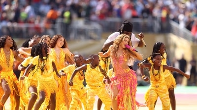 Shakira and Burna Boy perform during the Topps Final Halftime Show in the FIFA World Cup 2026 Final match between Spain and Argentina at New York New Jersey Stadium on July 19, 2026 in East Rutherford, New Jersey.   Lars Baron/Getty Images/AFP (Getty Images via AFP)
