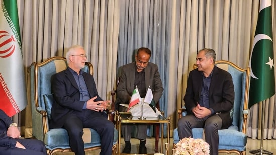 In this photo released by the Pakistan's Interior Ministry, Iran's Interior Minister Eskandar Momeni, left, meets with his Pakistani counterpart Mohsin Naqvi, right, upon arrival at Nur Khan airbase, in Rawalpindi, Pakistan, Monday, July 20, 2026. AP/PTI(AP07_20_2026_001031A)