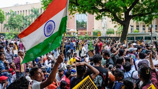 CJP supporters raise slogans during a protest march near the Parliament, outside RBI building in New Delhi.