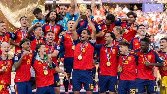 EAST RUTHERFORD, NEW JERSEY - JULY 19: Rodri #16 of Spain lifts the FIFA World Cup Winner�s Trophy after the team�s victory following the FIFA World Cup 2026 Final match between Spain and Argentina at New York New Jersey Stadium on July 19, 2026 in East Rutherford, New Jersey. David Ramos/Getty Images/AFP (Photo by David Ramos / GETTY IMAGES NORTH AMERICA / Getty Images via AFP)