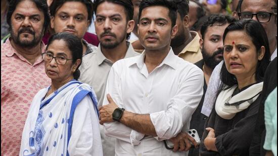 Trinamool Congress supremo Mamata Banerjee with party MPs Abhishek Banerjee and Mahua Moitra in Kolkata earlier this month. (PTI)