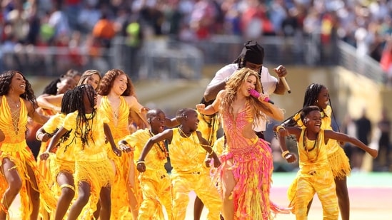 Shakira and Burna Boy perform during the Topps Final Halftime Show in the FIFA World Cup 2026 Final match between Spain and Argentina at New York New Jersey Stadium on July 19, 2026 in East Rutherford, New Jersey. Lars Baron/Getty Images/AFP(Getty Images via AFP)