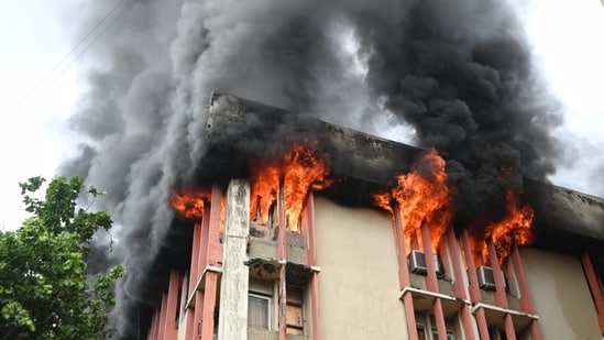 Fire fighters douse the fire broke out on the fourth floor of Jawahar Bhawan building in Lucknow on Monday, July 20, 2026. (Mustaq Ali/Hindustan Times)