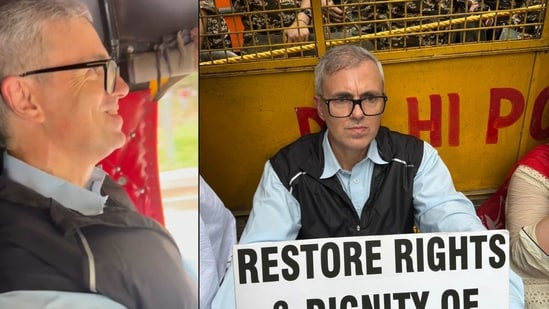 Jammu and Kashmir Chief Minister Omar Abdullah sits on a road during a protest march demanding the restoration of statehood to Jammu and Kashmir, in New Delhi.