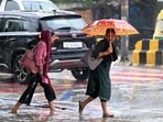 Gram it: Making their way through water-logged streets were these commuters at Kadipur Road in Gurugram. As monsoon showers lashed the city on Tuesday, NCR residents took to umbrellas and raincoats to make it through the day. IMD has predicted light to moderate rainfall accompanied by strong winds for today as well.