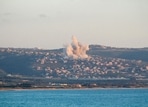 This photograph taken from the southern Lebanese area of Tyre shows smoke as it rises from the site of an Israeli airstrike that targeted the village Majdelzoun on May 6, 2026.