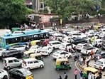 Vehicles stuck in a traffic jam at Connaught Place due to CJP Protest, in New Delhi on Monday. 