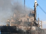 This handout photograph taken and released by the Ukrainian Navy on July 19, 2026 shows the destroyed civilian cargo ship Golden Leo on the Black Sea, following an alleged Russian missile strike.