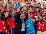 Luis de la Fuente, Head Coach of Spain, lifts the FIFA World Cup Winner's Trophy after the team's victory following the FIFA World Cup 2026 Final match