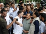 Rahul Gandhi talks with Jitendra Singh, Minister of State, PMO, during a sit-in protest outside Prime Minister Narendra Modi's residence, demanding accountability for police action against students, in New Delhi, India, July 21, 2026.