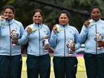 Lawn bowl gold medalists Lovely Choubey, Pinki, Nayanmoni Saikia and Rupa Rani Tirkey of Team India pose with their medals at the Birmingham 2022 Commonwealth Games. (Getty Images)