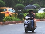 Light showers bring relief from the humid weather in New Delhi. (Arvind Yadav/ HT Photo)