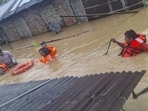 NDRF officials conduct a rescue operation in a flood-affected area in Assam. (X)