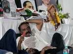 Actor Prakash Raj rests ahead of Cockroach Janata Party's (CJP) protest march, at Jantar Mantar, in New Delhi.