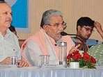 Panchkula deputy commissioner Satpal Sharma, Haryana development and panchayats minister Krishan Lal Panwar and Kalka MLA Shakti Rani Sharma during the grievance redressal meeting on Monday (Sant Arora /HT)