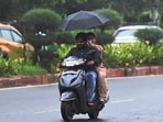 The overnight showers also helped improve Delhi's air quality.
