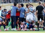 Leandro Paredes clashes with Gavi.