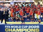 U.S. President Donald Trump and FIFA President Gianni Infantino hands the World Cup trophy to Spain's Rodri ahead of the trophy lift