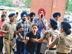 Students protesting against symposium on Shakti and Shriti at PU Campus on Monday. (Keshav Singh/HT)