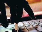 The 79-year-old victim was shown fictitious profits of <span class='webrupee'>₹</span>61 crore over 13 months. Police recovered laptops, SIM cards, cheque books and stamps. (File photo)